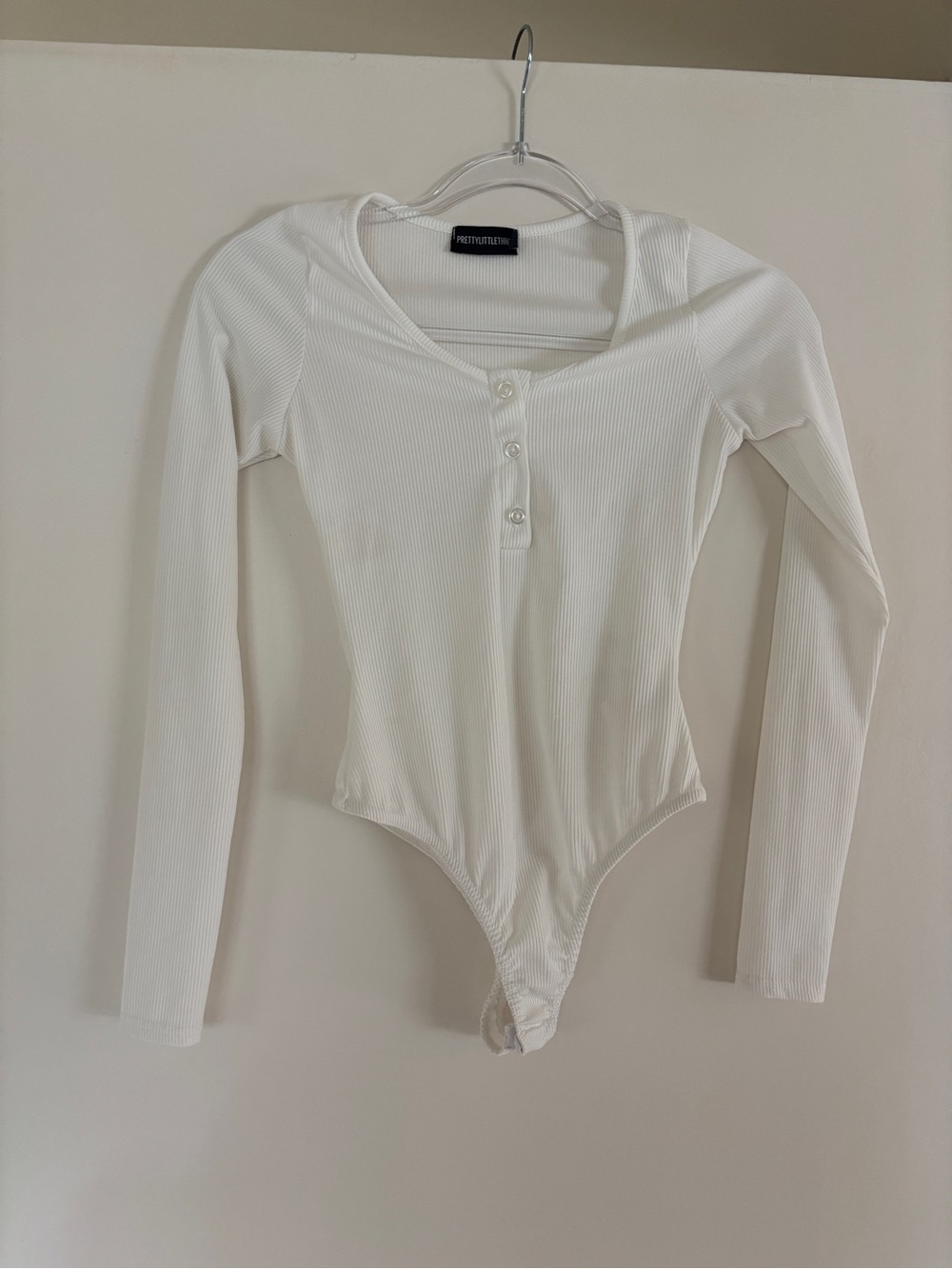 PrettyLittleThing White Ribbed Long Sleeve Henley Bodysuit